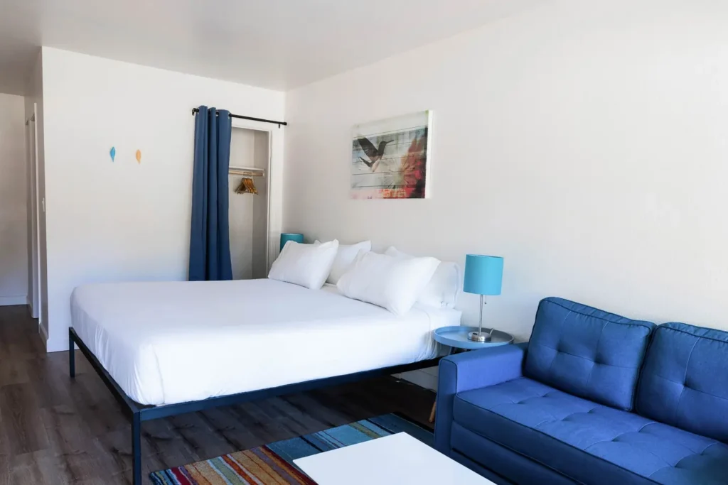 bohemianking patio room with 1 bed and 1 sofa